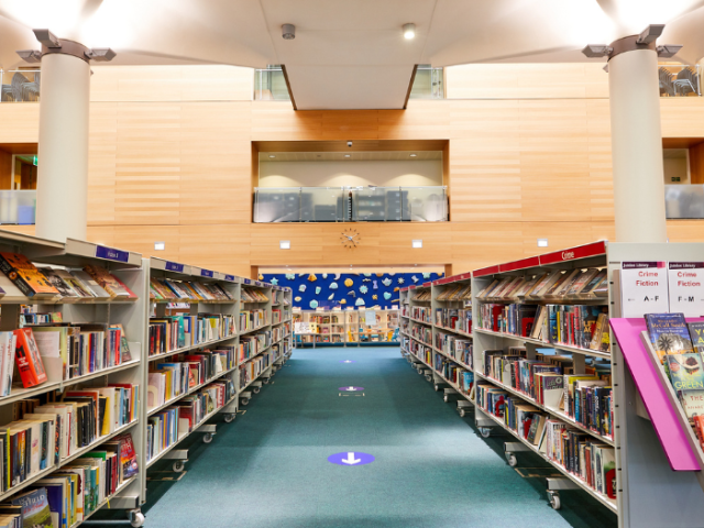 A photo of library shelves
