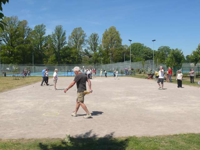 People playing petanque on the refurbished court in Preston Park