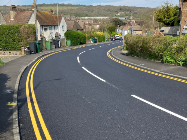A photo of a newly resurfaced road 