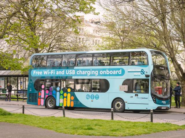 A landscape photo of a double decker bus