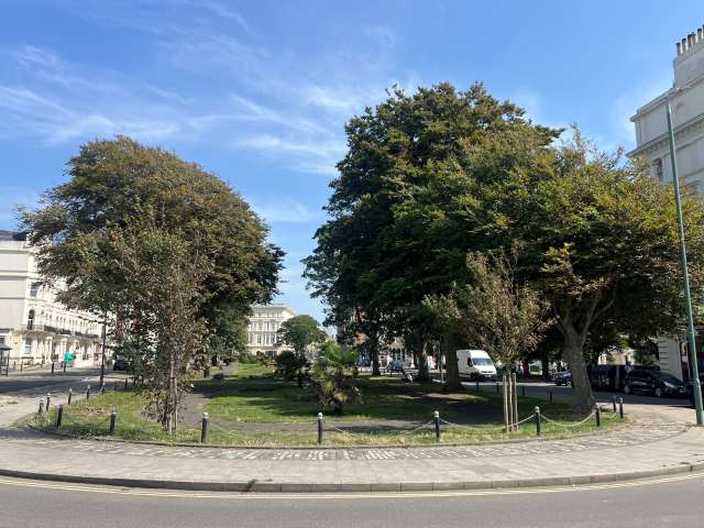 A view of Palmeira Square in Hove, taken from the road at the west end of the square