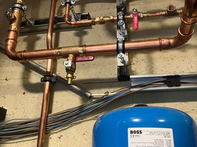 Copper pipework and new tank system in the boiler room of Peter Gladwin Primary School