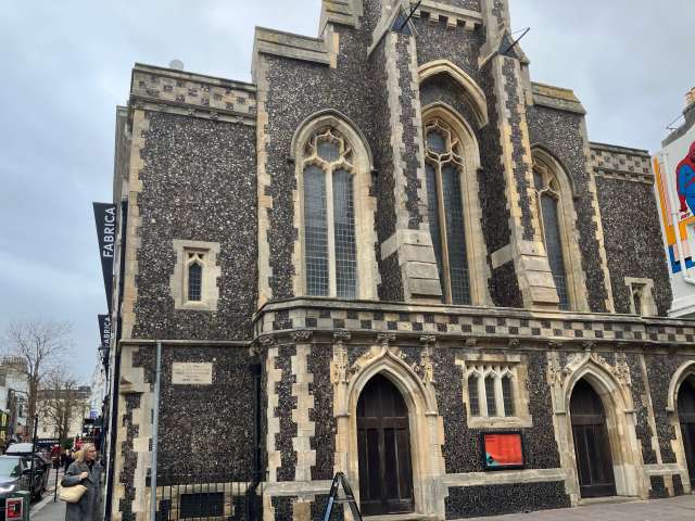 Exterior of the Fabrica gallery in Duke Street, Brighton, showing the former chapel frontage with stained-glass gothic windows