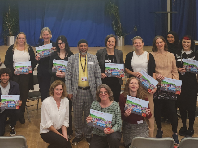 Leaders from health and food partnerships in Brighton & Hove standing together, holding copies of the latest Director of Public Health's Annual Report 