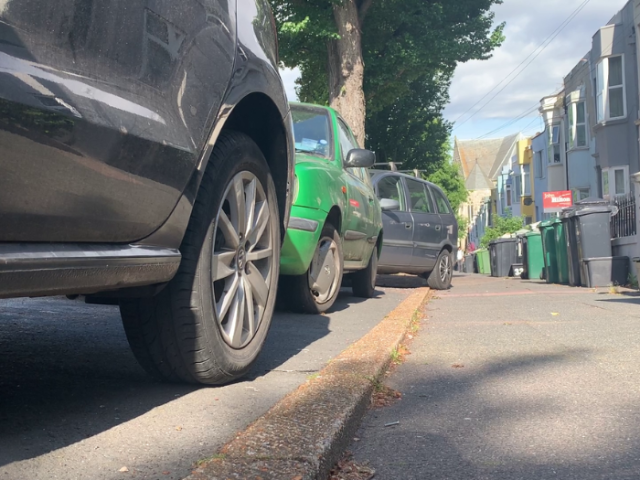 Cars parked on a pavement