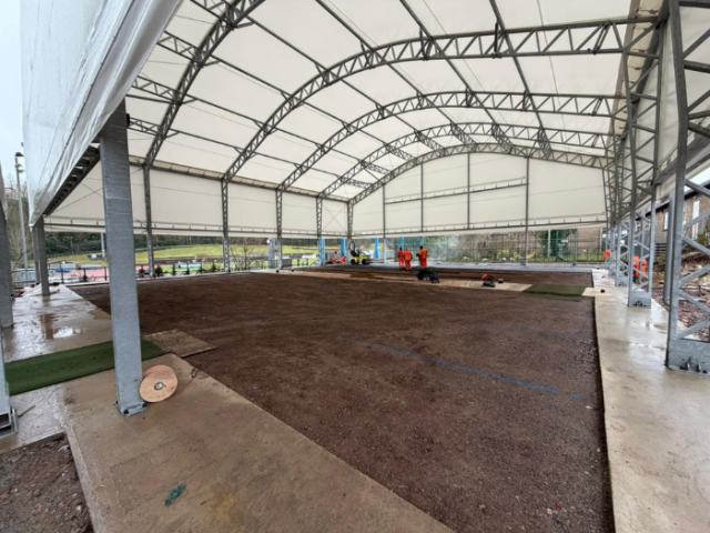 Picture showing the frame of the new indoor padel courts at Withdean, as work progresses