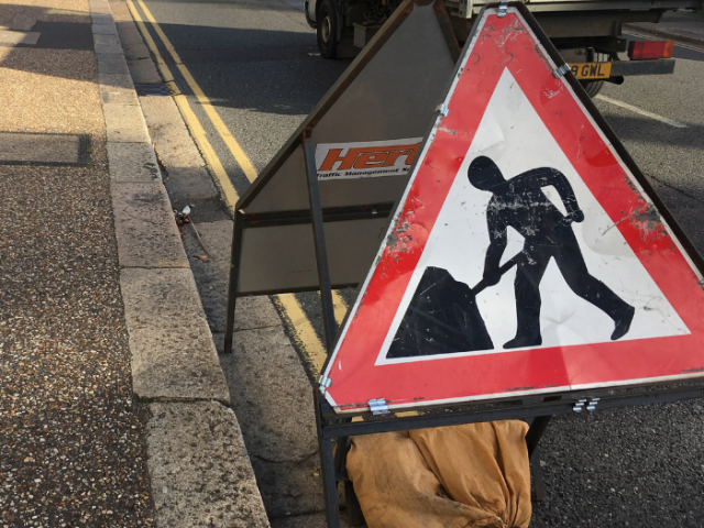 a picture of a roadworks street sign
