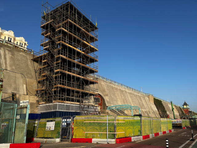 Tall structure covered in scaffolding at Madeira Terrace.
