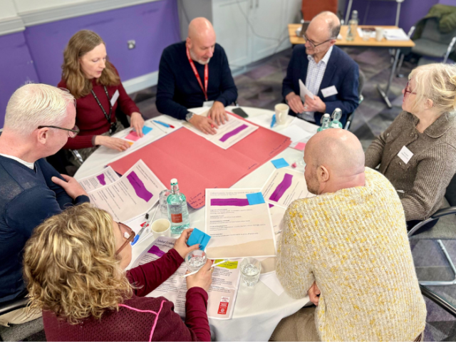 Representatives from the visitor economy discuss ideas round a table
