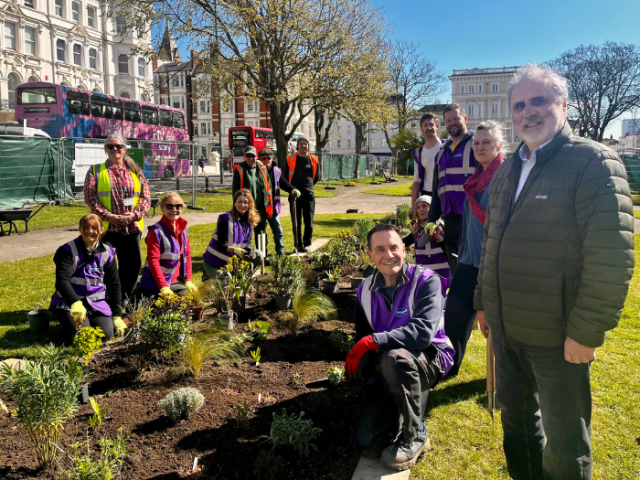Picture of Councillor Alan Robins with volunteers planting the re-designed beds in Palmeira Square