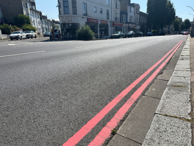 A road with two red lines running along it
