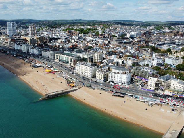 a city and beach shot from above