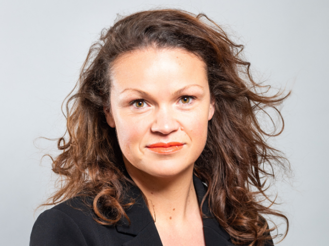 Councillor Bella Sankey facing the camera looking serious. 