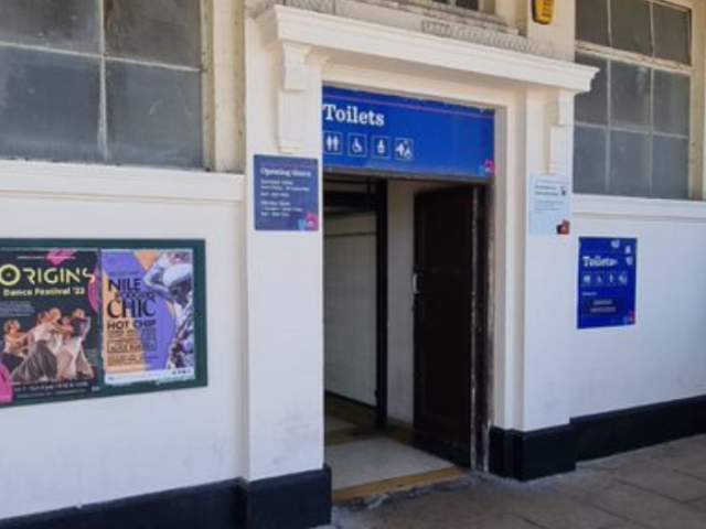 Blue door to toilets.