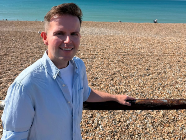 Cllr David McGregor by the iconic seafront railings which are being restored