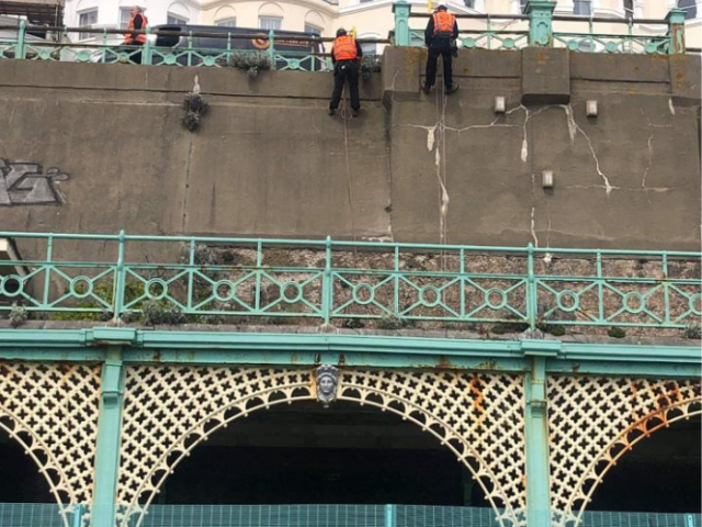 Abseilers cleaning Madeira Terrace