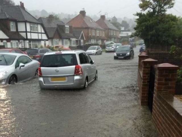 Flooded street with cars
