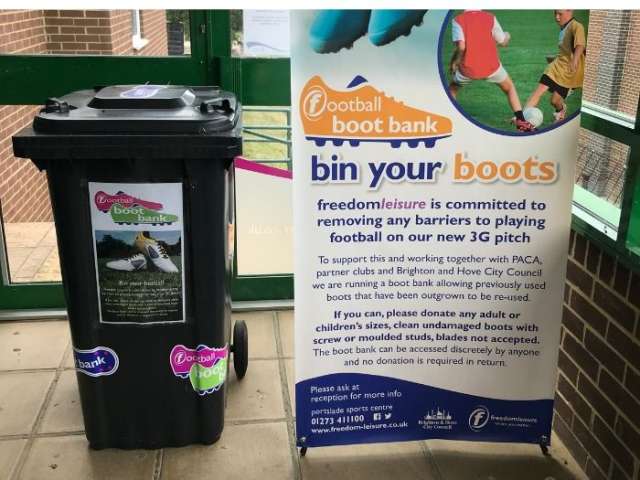 Example of football boot bank with sign about the scheme
