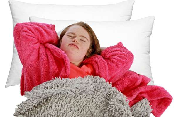 Person resting in bed.