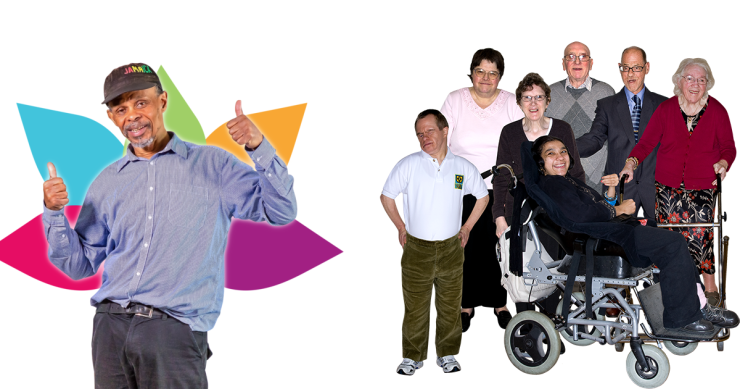 Man with thumbs up in front of a multi-coloured flower. Group of people.