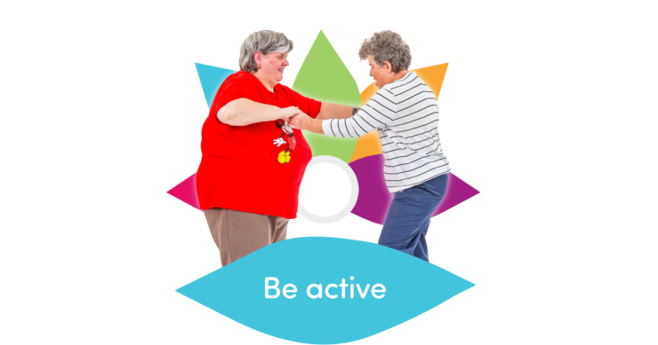 Two older people dancing to encourage people to be active.