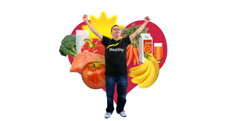 A person looking happy in front of healthy food and drink.