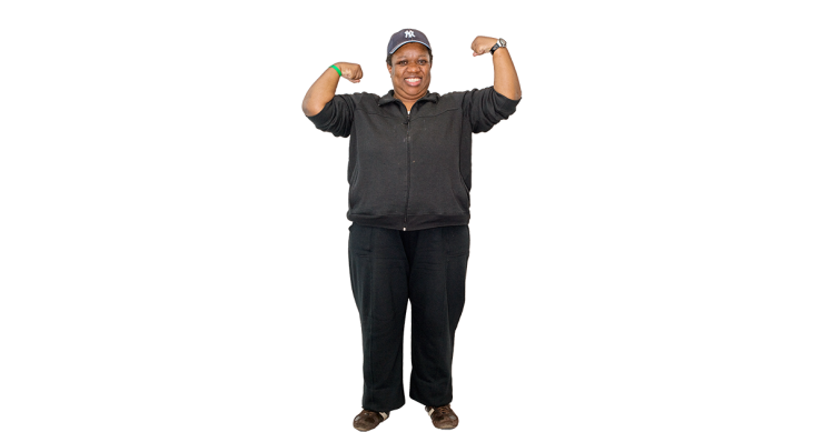 A person standing in a strong pose.