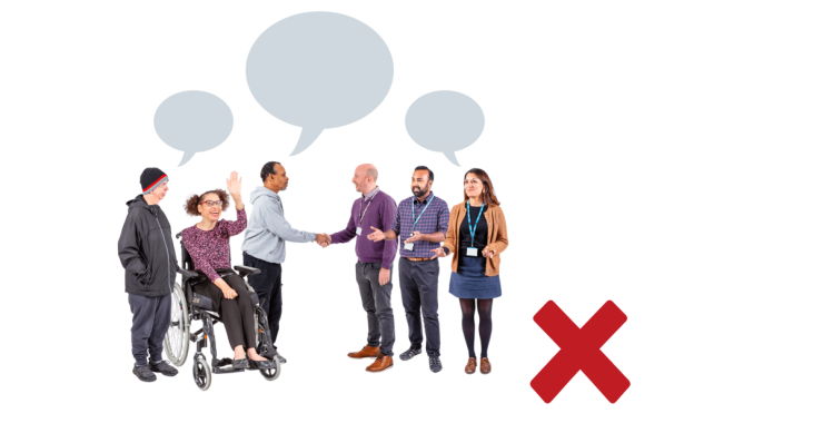 A group of people next to a red cross showing they're not working together