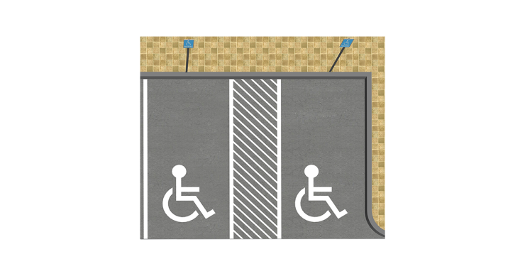 A wheelchair sign on a pavement to show where disabled parking bays are.