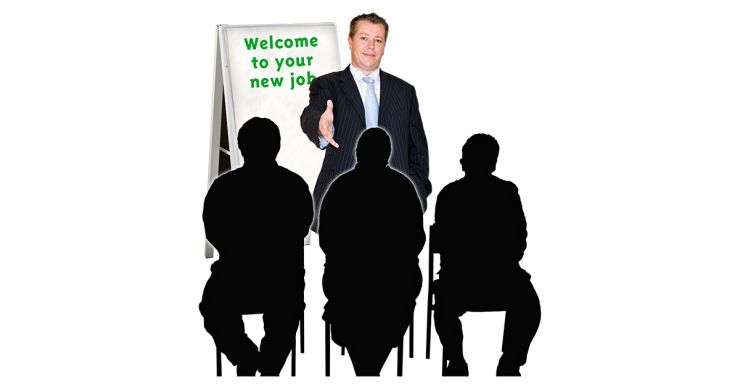 Person standing in front of 3 people welcoming them to their new job.