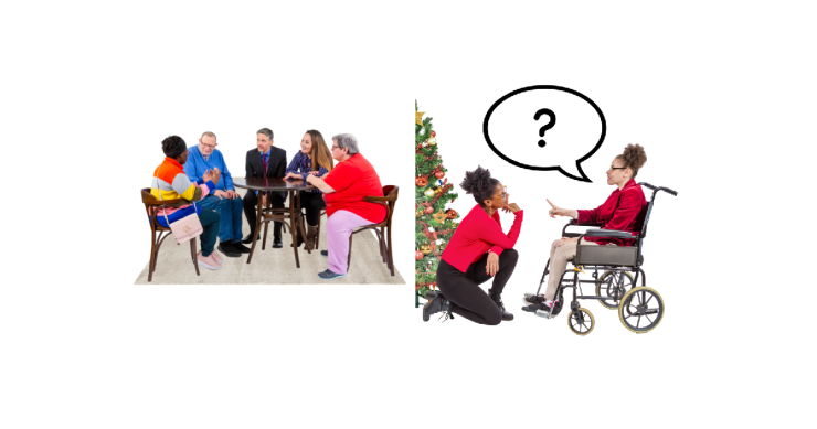 Group of people discussing around a table. Woman in wheelchair asking another woman a question.
