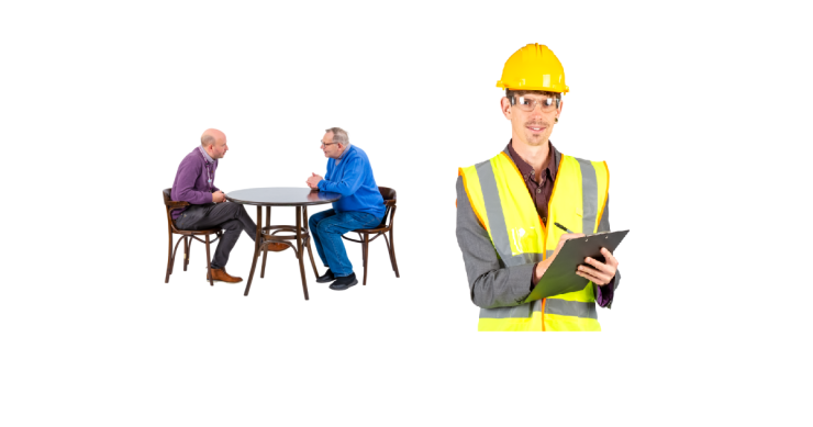 Two men talking across a table. Man with hardhat, high vis jacket and clipboard writing
