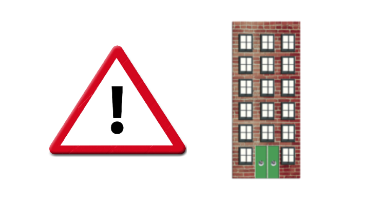 Triangle warning sign. Tall building.