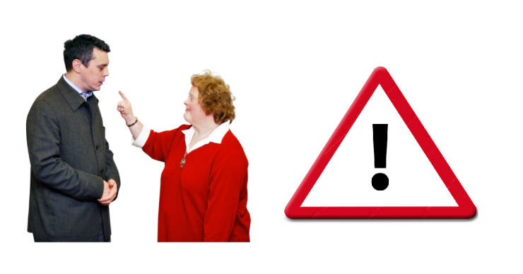 Woman complaining to man. Warning triangle sign.