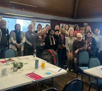 A photograph showing a group of people at a research ready communities workshop