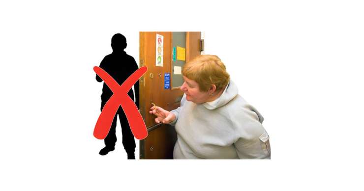 Woman opening the door to a stranger