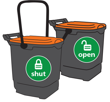 An outdoor food waste caddy for a household with a kerbside collection. It is a medium sized, grey bin with a bright orange lid. When the handle is fixed in the up position, the bin is locked. When the handle is down, looping down behind the back of the bin,  the bin lid is in the open position