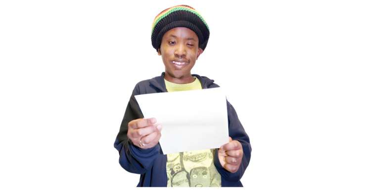 Person holding letter. 