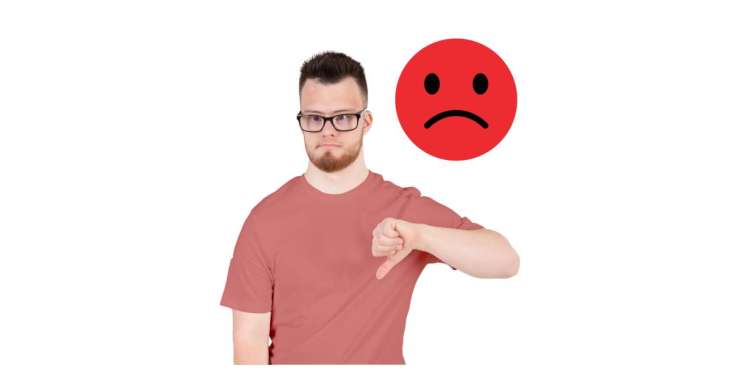 Person in red T-shirt giving thumbs down with a sad face icon beside them.